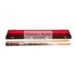 An autographed snooker cue, signed in silver marker pen by Ronnie O'Sullivan, Ken Doherty,