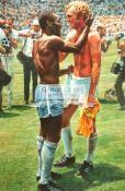An original work of art by Peter Cornwell "Pele and Bobby Moore swapping shirts at the 1970 World