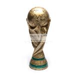 A resin full-size replica of the FIFA World Cup Trophy, realistically modelled,