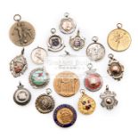 A miscellany of 18 football medals, one 9ct.