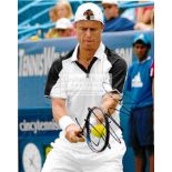 A group of seven photographs signed by tennis players, comprising: Lleyton Hewitt, Pat Cash,