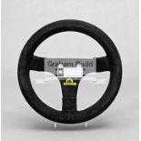 Elio de Angelis' 1983 Italian GP Lotus-Renault 94T F1 steering wheel, the rim bound in black suede,