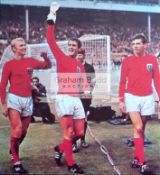 England 1966 World Cup Winners photograph signed by Bobby Moore, Geoff Hurst & Martin Peters,