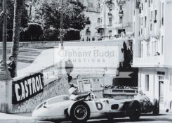 Signed Rudolfo Mailander photograph depicting Stirling Moss in his Mercedes Benz at the hairpin