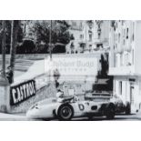 Signed Rudolfo Mailander photograph depicting Stirling Moss in his Mercedes Benz at the hairpin