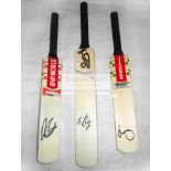 A group of four mini-bats signed by the Australian cricketers Steve Smith, David Warner,