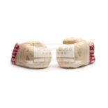 A pair of autographed boxing gloves, a pair of white Title gloves,