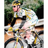 Colour photographs signed by the cyclists Mark Cavendish and André Greipel, 10 by 8in.