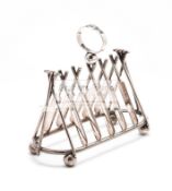 Silver plated cricket-themed novelty toast rack,