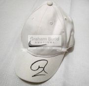 Tennis caps signed by Rafael Nadal and Andy Murray, signed in black marker pen,