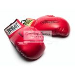 Boxing gloves signed by Muhammad Ali and Joe Frazier, two right-hand red Everlast gloves,