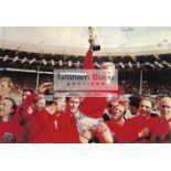 Iconic England 1966 World Cup winner's colour picture signed by Bobby Moore,