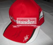 F1 caps signed by Sebastian Vettel, Jenson Button & Daniel Ricciardo, a Ferrari,