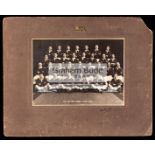 A signed official photograph of the 1930 British [Lions] Rugby Team, a mounted 8 by 11in.