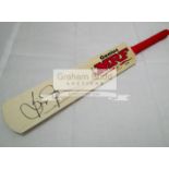 A trio of mini-bats signed by the West Indies cricketers Brian Lara,