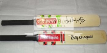 Mini-bats signed by Australian cricket legends Greg and Ian Chappell,