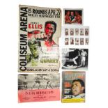 A miscellany of boxing memorabilia, including original press photographs, a group of site posters,