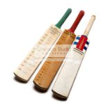 Three autographed cricket bats,