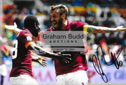 Three photographs signed by Italian Serie A footballers,