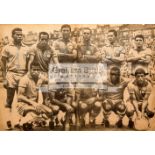 Newspaper picture part-signed by the Brazil football team circa 1966, approx. 16 by 12in.