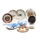 A collection of nine souvenir Olympic Games plates,