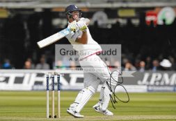 Seven signed photographs of England cricketers. all 10 by 8in.