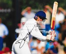 Seven signed photographs of England cricket greats, signed in black marker pen by David Gower,