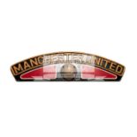 Manchester United replica locomotive nameplate, painted wood & plaster, length 88cm.