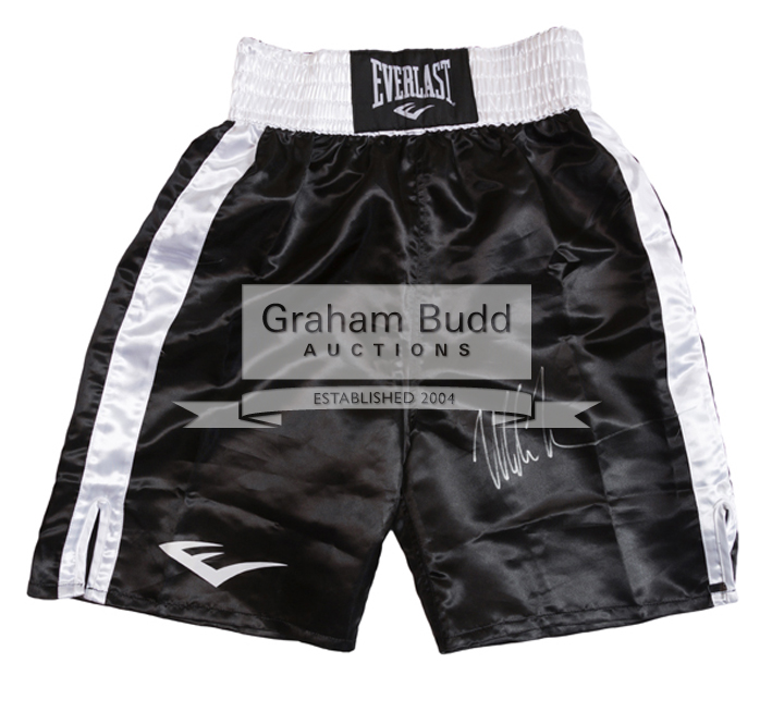 Mike Tyson signed boxing trunks, black & white 'satin' Everlast, signed in silver marker pen,