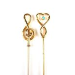 Pair of 9 ct yellow gold hat pins.