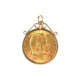 Gold sovereign in a 9 ct yellow gold mount. 1909 King Edward VII.