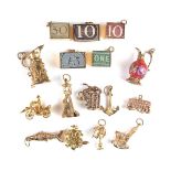 Collection of 9 ct yellow gold charms.