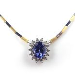 14 ct yellow and white gold tanzanite and diamond pendant necklace.