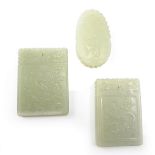 A group of three Chinese celadon jade pendant plaques.