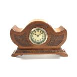 A Naval 'HMS Impregnable' carved wood mantle clock. Of Napoleonic form and inscribed 'Feb 20 H.M.S.