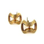 Pair of 14 ct yellow gold cufflinks. Figure of eight design with textured and polished gold.