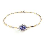14 ct yellow and white gold tanzanite and diamond cluster bracelet.