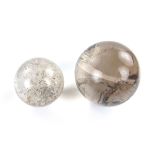 Pair of rock crystal quartz spheres.
