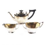 A George V silver three piece tea set.