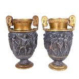 A pair of Victorian partially gilt copper Neo-classical urns. (2 items) 7.6 in (19.2 cm) height.