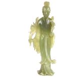 A large Chinese carved jade figure of Guanyin.