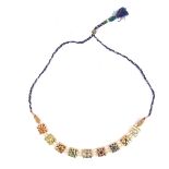 A Mughal style yellow gold multi-gem Navaratna Indian necklace.