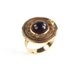 Cabochon plaque ring.