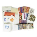 A large collection of Hermes Paris scarf seasonal booklets.