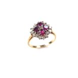 18 ct yellow gold ruby and diamond cluster ring.