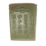 A Chinese celadon jade pendant plaque.