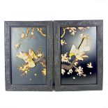 A pair of Chinese lacquered decorative panels.