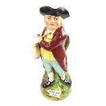 A Staffordshire Toby jug of 'Hearty Good Fellow', early 19th century. 11.1 in (28.3 cm) height.