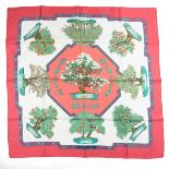 A Hermes Paris 'Bonsai' silk square scarf. Designed by Catherine Baschet for Hermes, circa 1991.