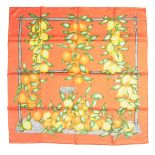 A Hermes Paris 'Citrus Garden' silk square scarf. The original orange box is included.